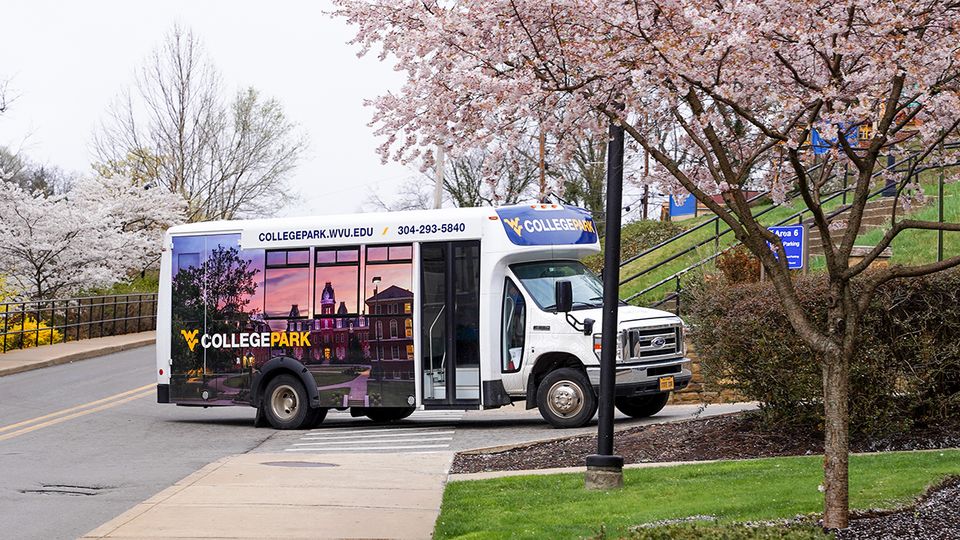A College Park shuttle driving on campus