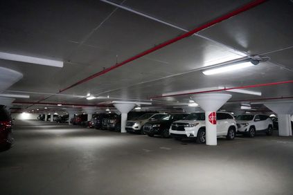 Cars parked in the lower level of the Mountainlair parking garage